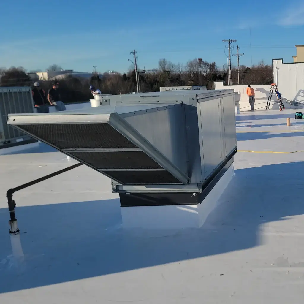 Commercial TPO roof installation, showcasing seamless integration and expert craftsmanship.