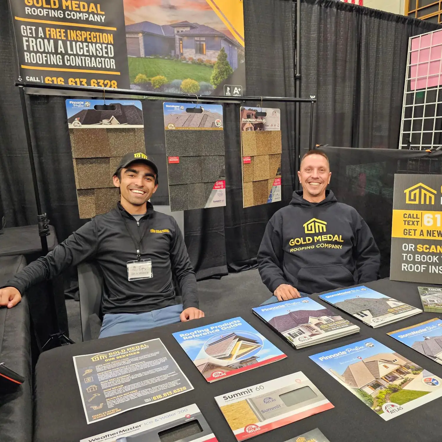 Two experienced roofing professionals from Gold Medal Roofing, proudly serving Mobile, Alabama.